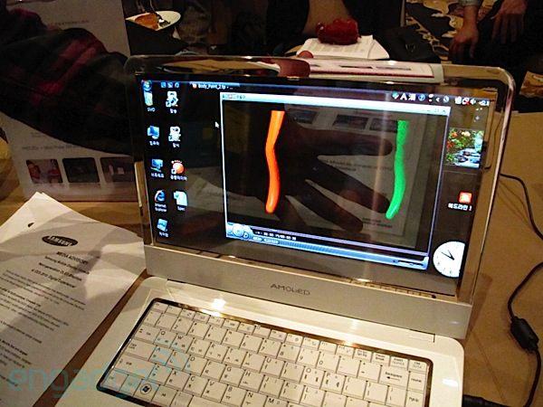  Autors: KuulAsIce Pasaulē pirmais klēpjdators ar caurspīdīgu ekrānu