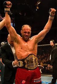  Autors: NEOVO Randy Couture